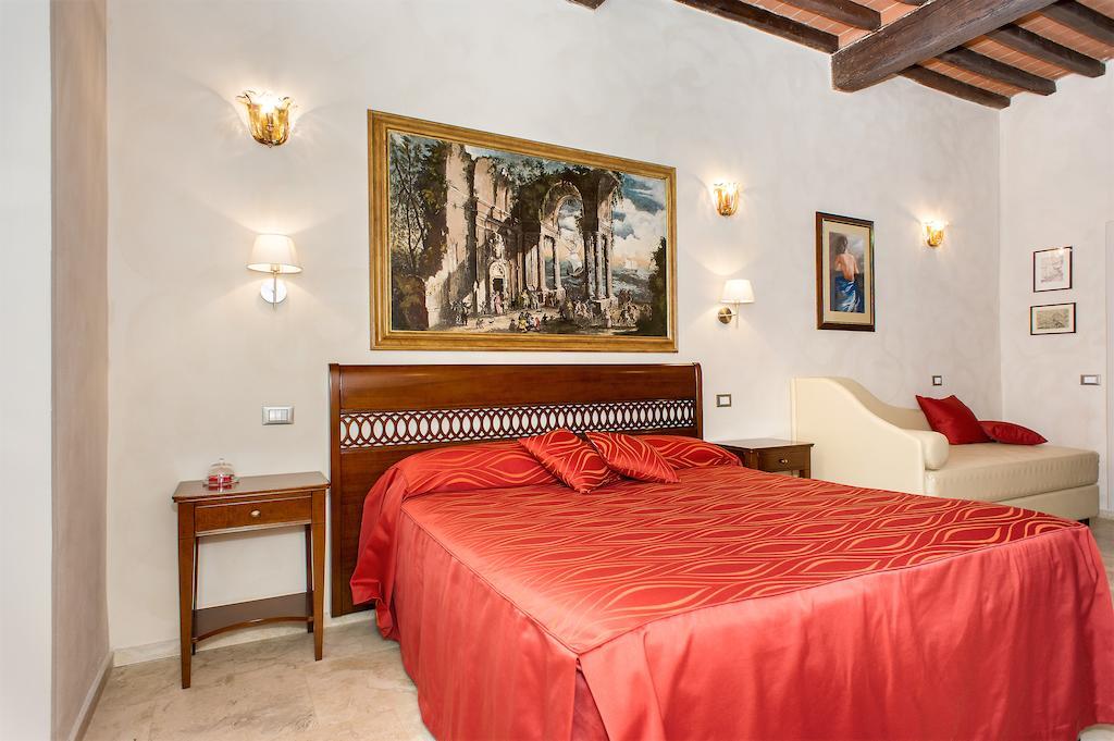 ピサ ルレ デイ メルカンティ B＆B アンド スイーツ Bed & Breakfast 部屋 写真